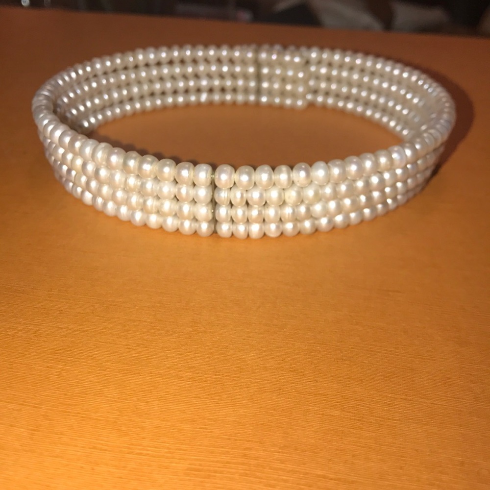 Faux pearl choker.